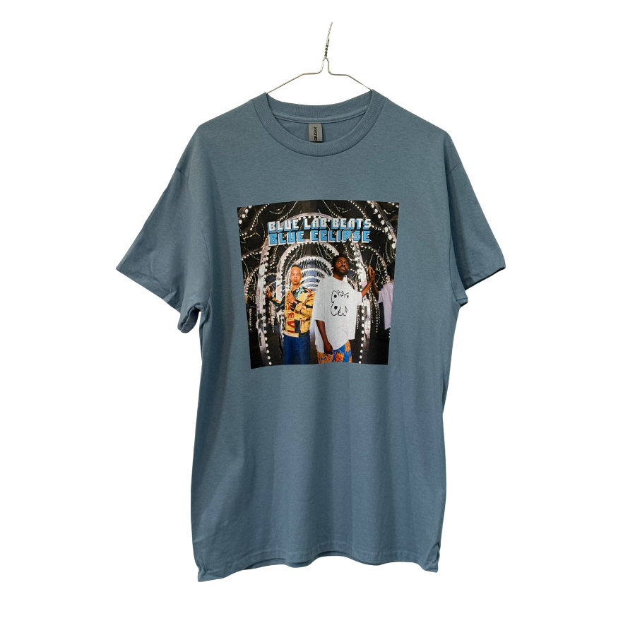 Blue t-shirt with graphic design of two people and text 'Blue Lab Beats Blue Eclipse' Cover art of Blue Lab Beats forth album on white background.