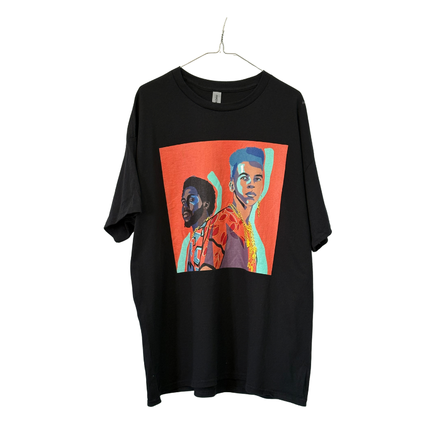 Black t-shirt with colorful graphic design on a white background