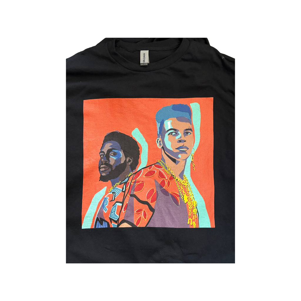 Zoomed in Black t-shirt with a colorful graphic of two people on an orange background